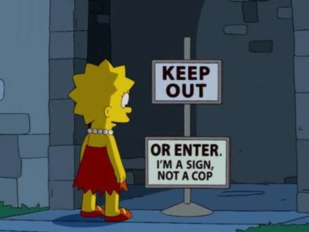 Lisa Simpson standing in front of a sign reading “Keep out… or enter. I'm a sign, not a cop.”